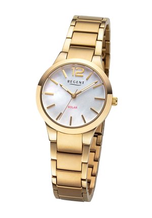 Montre en acier inoxydable doré avec un cadran rond, un visage en nacre, des index dorés et le texte « SOLAR » en rouge. Elle est dotée d'un bracelet à maillons.