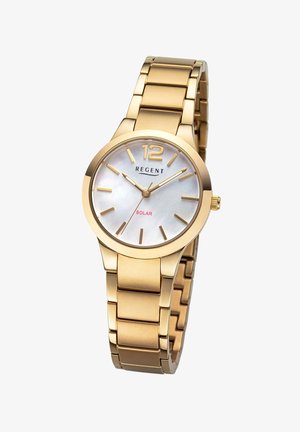 Montre en acier inoxydable doré avec un cadran rond, un visage en nacre, des index dorés et le texte « SOLAR » en rouge. Elle est dotée d'un bracelet à maillons.