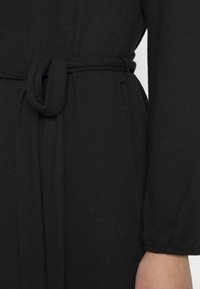 NA-KD PAMELA REIF x NA-KD - DROPPED SHOULDER MINI DRESS - Vestido de malha - black