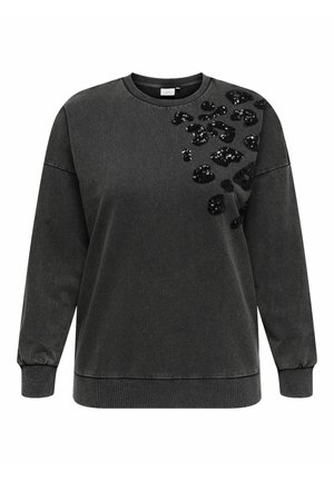 Sweatshirt noir à col rond, à manches longues, avec un devant texturé orné de détails en sequins noirs dans un motif à pois.