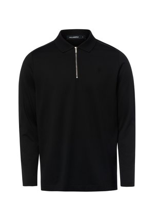 Zwarte polo met lange mouwen, een zilveren rits aan de voorkant en een kraag, getoond op een witte achtergrond.