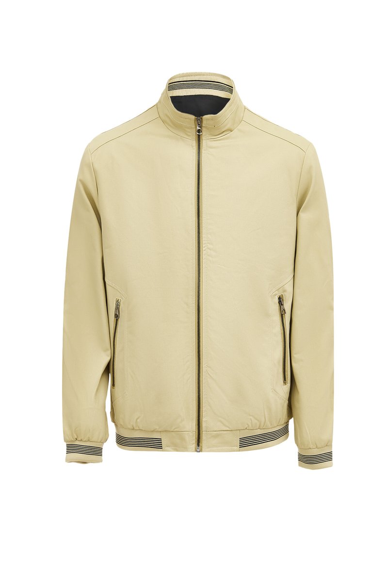 Helle beige Jacke mit einem Reißverschluss vorne, seitlichen Taschen und einem Stehkragen. Verfügt über gerippte Bündchen und einen unteren Saum mit gestreiften Akzenten.