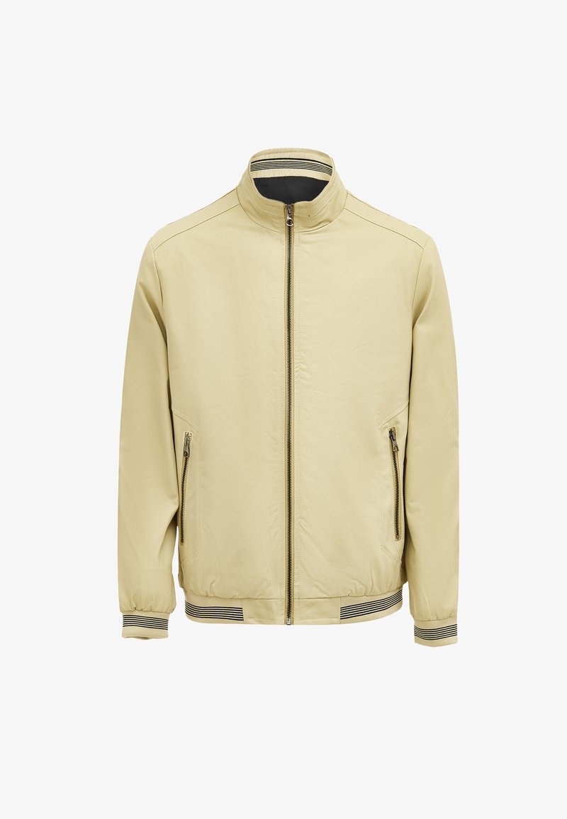 Helle beige Jacke mit einem Reißverschluss vorne, seitlichen Taschen und einem Stehkragen. Verfügt über gerippte Bündchen und einen unteren Saum mit gestreiften Akzenten.