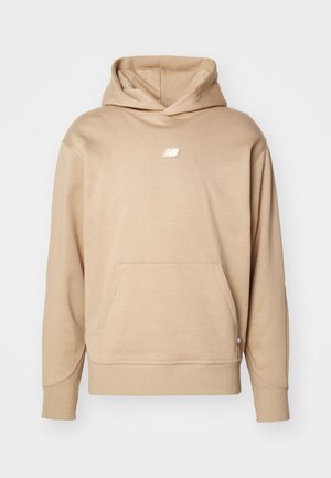 Beige hooded sweatshirt made from soft material. Features a front pouch pocket and a small logo on the chest. Ribbed cuffs and hem.