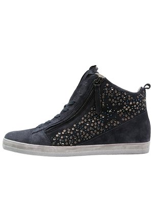 Dark blue suede high-top sneaker with side zipper, round metal studs decoration, and white rubber sole.