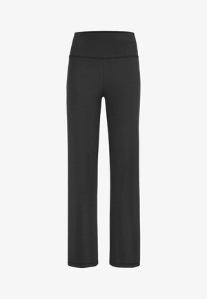 Zwarte yoga broek met hoge taille, wijde pijpen en zichtbare stiksels aan de tailleband en zoom.