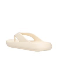 Light beige flip-flop with textured upper strap, open-toe design, and a cushioned sole. Features a flat sole and smooth contours.