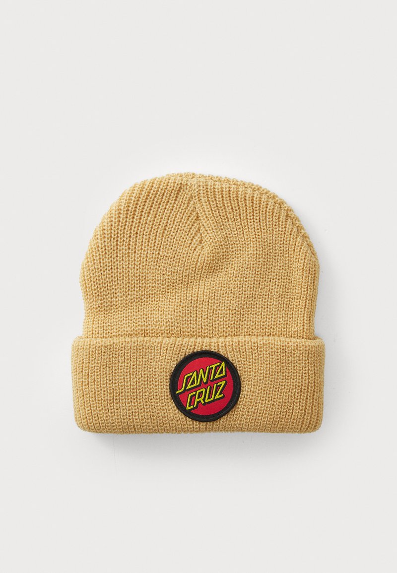 Yellow knitted beanie with a ribbed texture, featuring a circular red and black patch displaying "SANTA CRUZ" in bold letters.