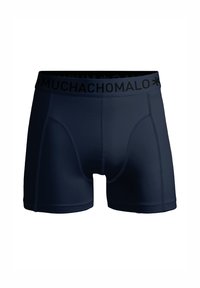 Mörkblå boxershorts i stretchigt tyg, med en svart elastisk midjeband som har "MUCHACHOMALO" logo och subtila sömdetaljer.