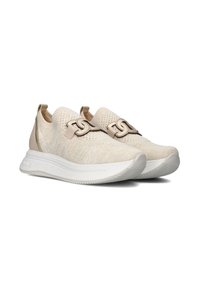 Beige knit sneakers with a textured finish, featuring a metallic accent and a cushioned white sole designed for comfort and style.