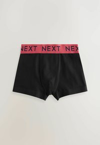 Čierne bavlnené boxerky s ružovým elastickým pásom, na ktorom je v námorníckej modrej farbe vytlačené slovo "NEXT". Hladká textura a klasický strih.