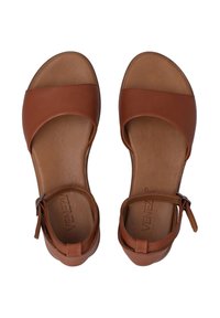 Bruine leren sandalen met platte zolen, brede voorkeursband en enkelband met een gesp. Soepele textuur en minimalistischer ontwerp.