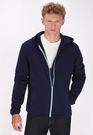 Marineblauwe zip-up hoodie met een voorste rits in lichtblauw, lange mouwen en een capuchon. Zacht materiaal en zijzakken accentueren het ontwerp.