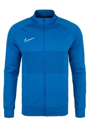 Blaues Nike Sportjacke mit Reißverschluss, langen Ärmeln und hohem Kragen, mit weißem Nike Swoosh-Logo auf der Brust.