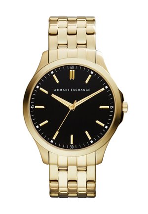 Orologio con cinturino in metallo dorato, quadrante nero, indici delle ore dorati e logo Armani Exchange al centro.
