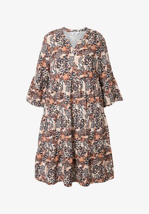 Kukudhi cha maua katika kitambaa chelight, chenye shingo ya V, mikono ya kengele, na sketi iliyo na sehemu kadhaa yenye mifumo ya chui ya rangi ya kahawia, nyeusi, na kremu.