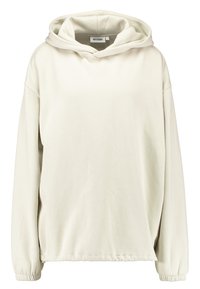 Biała bluza z kapturem o luźnym kroju, ze ściągaczami na rękawach i prostą, gładką fakturą. Nie posiada widocznych wzorów ani ozdób.