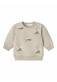 Felpa beige con colorati unicorni ricamati e stelle. Polsini e orlo a costine, tessuto morbido, design casual.