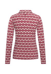 Red long-sleeve shirt featuring a patterned design with white floral shapes and black accents. Fabric texture appears smooth.