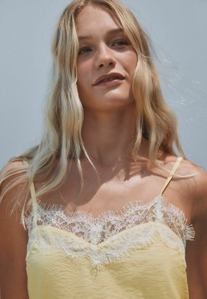 Next, Top - butter yellow