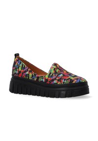 Multicolored slip-on shoes with a textured fabric upper featuring a floral pattern, black rubber sole, and platform design for added height.