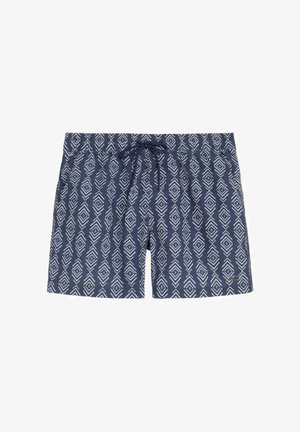 Bañador corto azul marino con estampado geométrico blanco de diamantes y flechas, cintura elástica y cordón delantero.