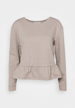 Beige women's top med lange ærmer, rund halsudskæring og flæsekant, lavet af blødt strikstof.