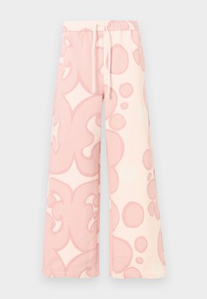 Pantalones de pierna ancha en algodón rosa suave con un patrón abstracto en tonos rosa claro de formas y burbujas, con una cintura elástica y cordón ajustable.