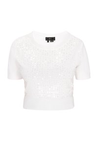 Weißer kurzärmliger Pullover mit geripptem Saum, der ein Paillettenmuster auf der Vorderseite für Struktur und Glanz aufweist. Größenetikett innen sichtbar.