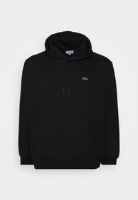 Sudadera negra con bolsillo frontal, capucha con cordón y un pequeño logo verde de Lacoste en el pecho. Fabricada con un suave material de mezcla de algodón.