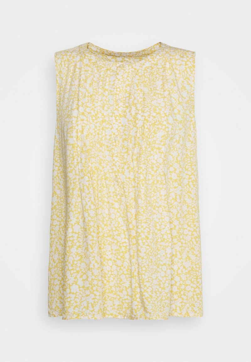 Blouse sans manches et légère avec un motif floral jaune et blanc, col rond et coupe décontractée.