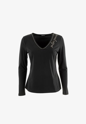 Top negro de manga larga con escote en V. Presenta costuras decorativas en un color más claro a lo largo del cuello y una superficie texturizada.