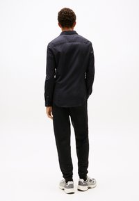 Tommy Jeans ORIGINAL STRETCH SHIRT - Camisa - black