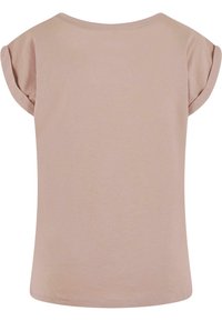 Haut rose clair à manches courtes avec un col rond, présentant des manches retroussées et une texture douce et lisse. Pas de motifs ni d'embellissements.