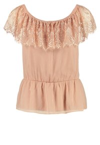 Haut péplum rose poudré avec un surplis en dentelle à volants, tissu léger froissé et taille élastiquée pour une coupe décontractée.