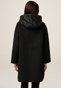 Oltre Halflange jas - nero