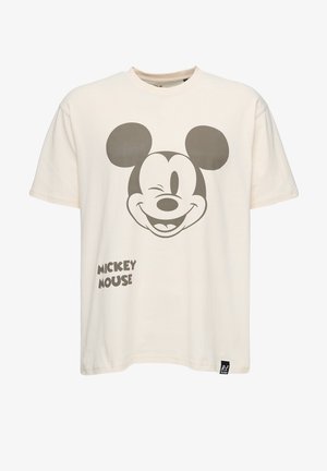 Crème katoenen t-shirt met een grote grijze Mickey Mouse afbeelding die knipoogt, en de tekst "MICKEY MOUSE" in het vet onderaan links.