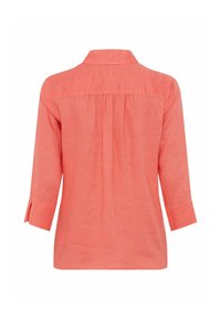 Coral linen shirt with a back yoke pleat, 3/4 sleeves, and side slits at the hem. Features a classic collar and lightweight texture.