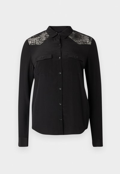 Black long-sleeve shirt with button closure, two chest pockets, and lace detailing on the shoulders. Smooth fabric with a classic collar.