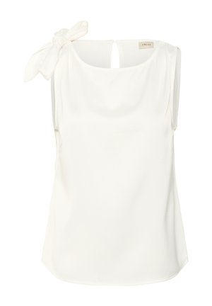 Sleeveless cream blouse with a round neckline and a large tied bow on the left shoulder.