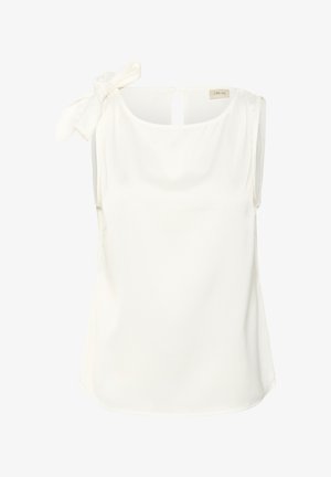 Beżowa bluzka bez rękawów z okrągłym dekoltem i dużą związaną kokardą na lewym ramieniu.