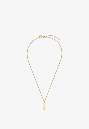 Dünne goldene Halskette mit rechteckigem Anhänger, auf dem "see the good" eingraviert ist, und einem kleinen runden Anhänger nahe dem Verschluss.