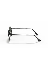 Occhiali da sole in stile black metal con lenti scure, montatura sottile e steli dritti. Presentano una forma delle lenti rotonda e un design leggero.