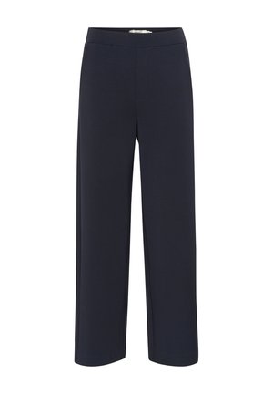 Pantalons larges bleu marine en tissu doux avec une taille élastique et sans poches visibles ni ornements.