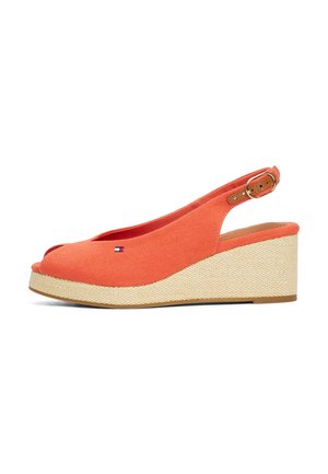 Orange fabric wedge sandal with an open toe, slingback design, and woven jute-textured platform. Features a gold-tone buckle accent.