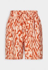 Shorts à taille élastique avec imprimé animal abstrait orange et blanc et cordon à nouer à l'avant.