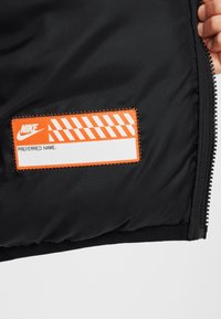 Nike Sportswear UNISEX - Zimska jakna - black