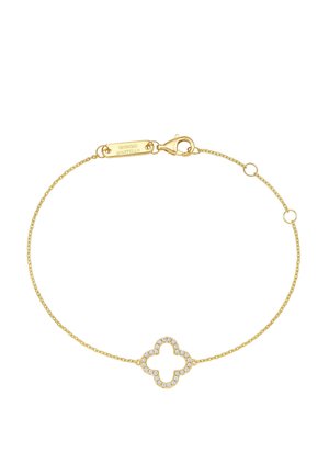 Delicate gold chain bracelet with a diamond-studded quatrefoil charm and a lobster clasp engraved with Giorgio Martello.