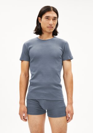 Gray cotton t-shirt with short sleeves and a crew neckline paired with matching gray boxer shorts, featuring a smooth texture and fitted design.
