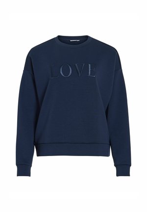 Sügavsinine pusa pehmest kangast, millel on ees tekstuuriga "LOVE" applikatsioon, lõdva lõike ja soonikkoes varrukasäärtega.